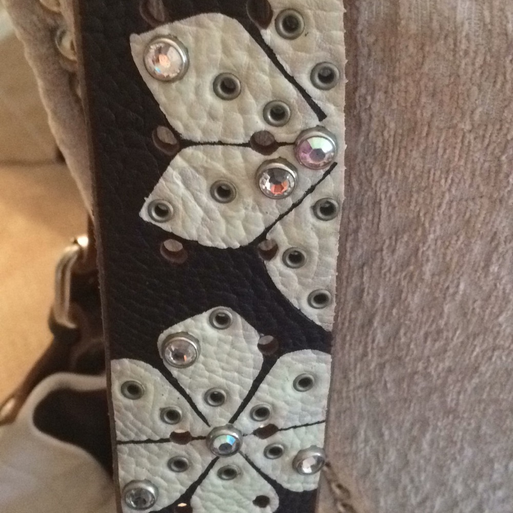 Tylie Malibu white leather studded hobo bag.